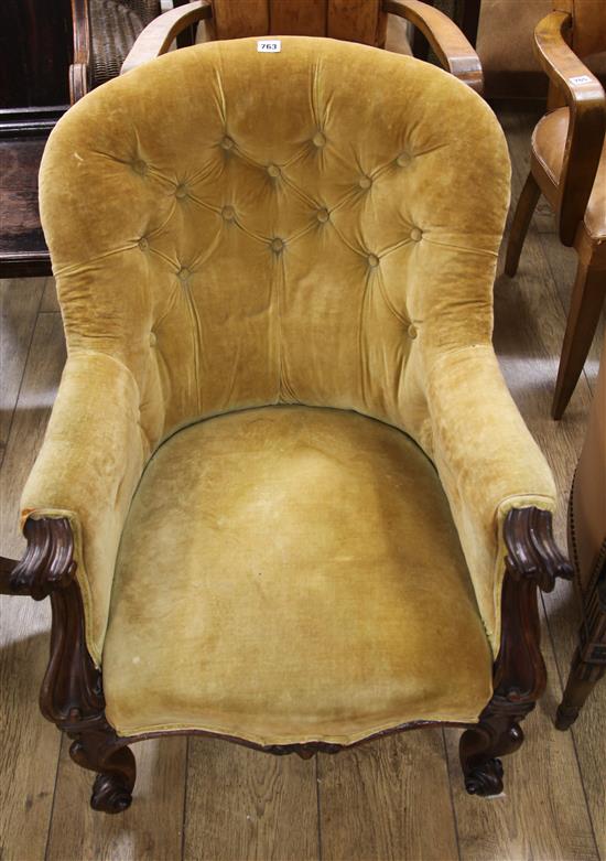 A Victorian buttonback armchair